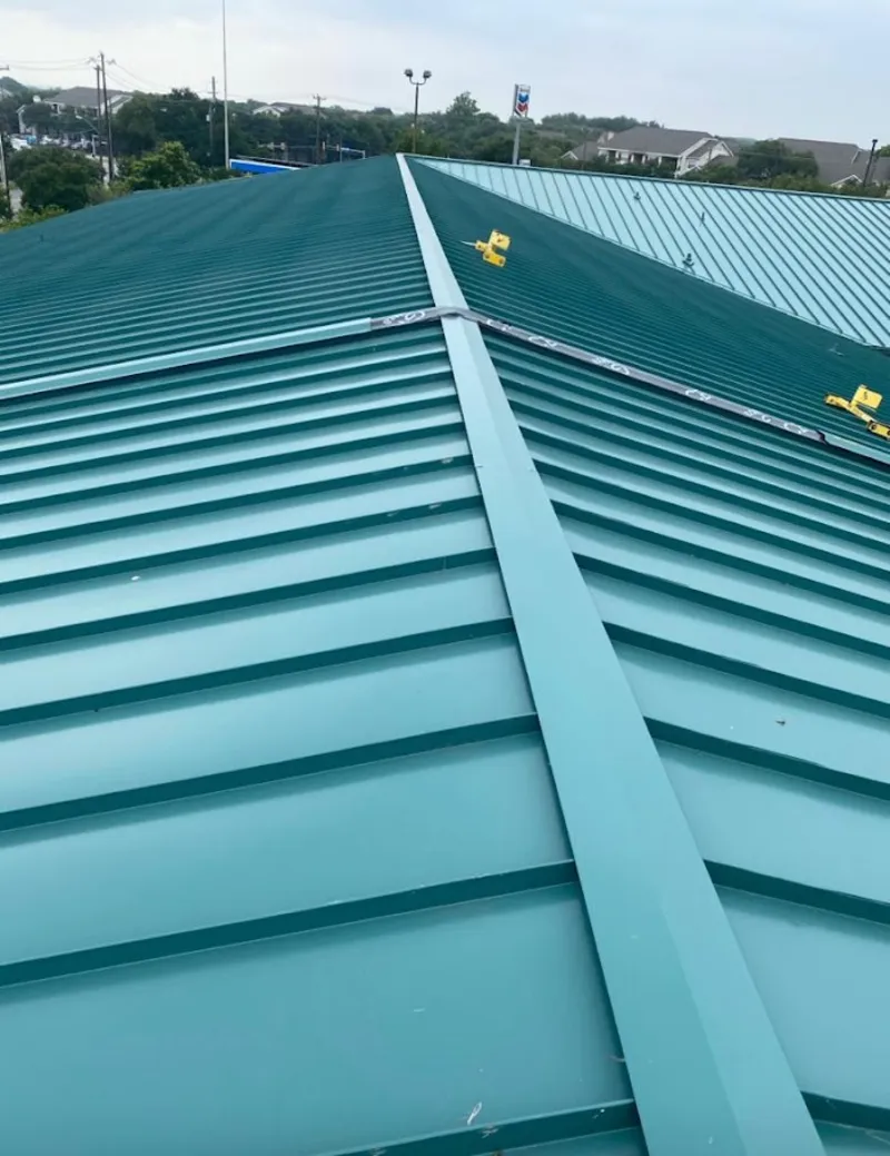 Green commercial metal roof ridge and valley for Metal Roof Repair in Maple Heights