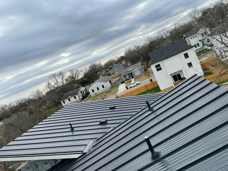 Standing seam metal roof panels with vents for Skylight Repair in Maple Heights